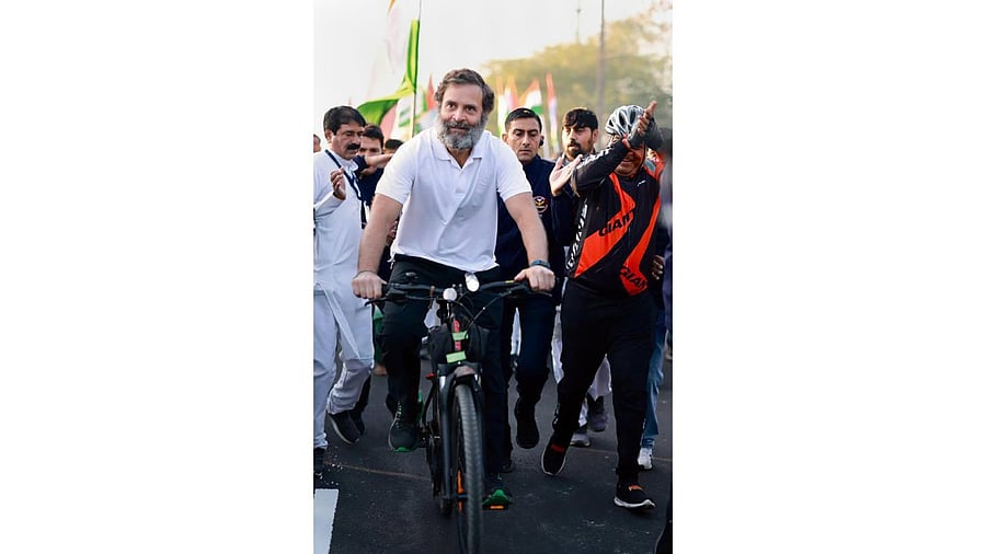 Rahul Gandhi rides a bicycle during Congress's Bharat Jodo Yatra. Credit: PTI Photo