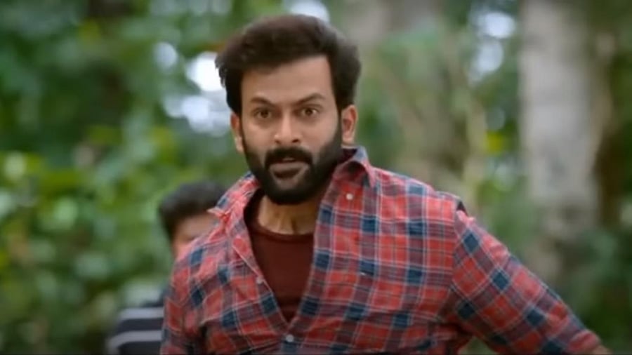 Prithviraj Sukumaran plays a mobile shop owner. Credit: Screengrab