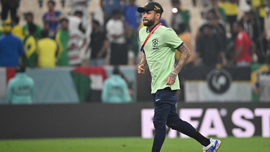 Brazil's forward Neymar runs across the pitch after the Qatar 2022 World Cup Group G football match between Cameroon and Brazil. Credit: AFP File Photo