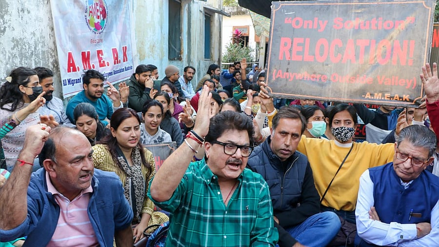 Film maker Ashoke Pandit alongside Kashmiri Pandits demand their relocation at a protest in Jammu. Credit: PTI File Photo