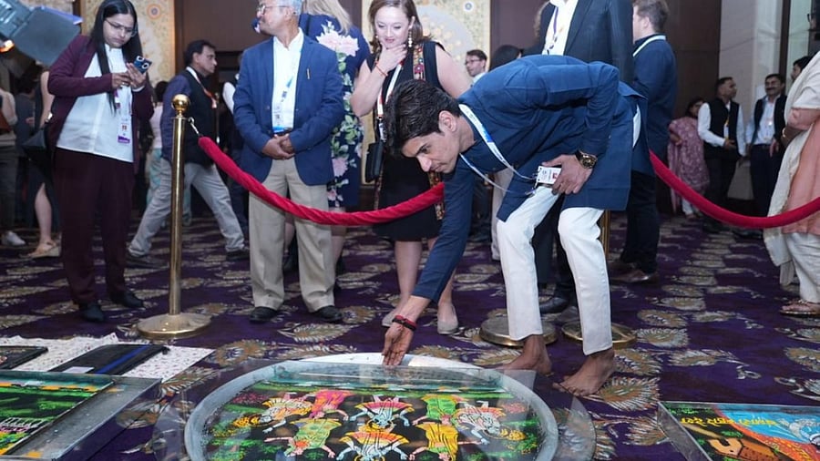 India's G20 Sherpa Amitabh Kant with leaders watches the Jal Sanjhi art form during the first G20 Sherpa meeting under India's presidency. Credit: PTI Photo