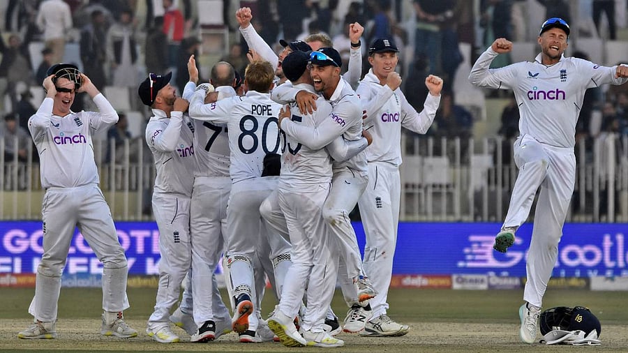 England's players celebrate after winning the match. Credit: Reuters Photo