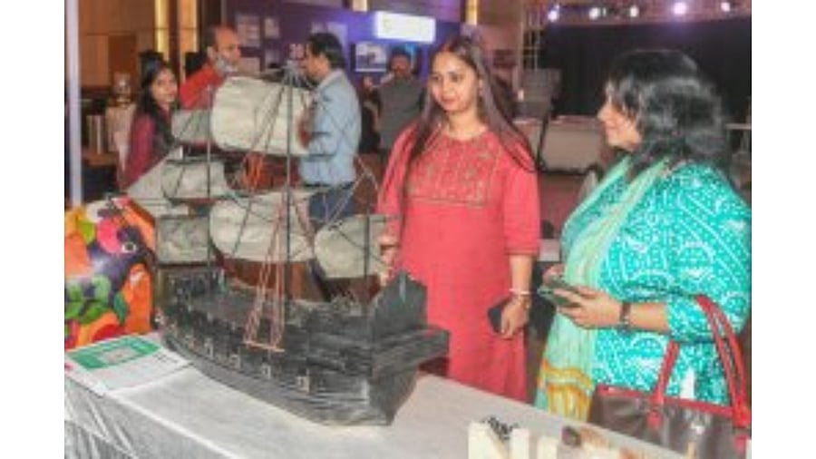 Visitors look at exhibits at the design conference on Thursday. DH Photo/S K Dinesh