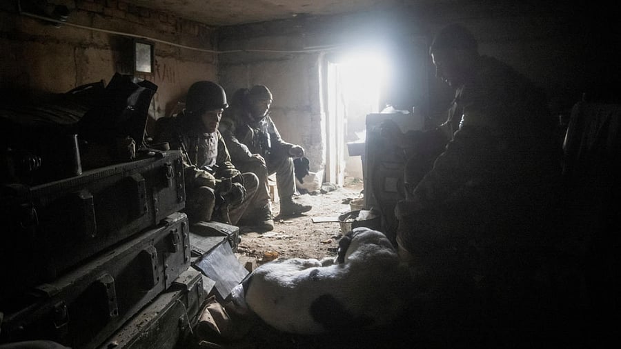Ukrainian service members rest in their shelter in Bakhmut, as Russia's attack on Ukraine continues, in Donetsk region, Ukraine, December 9, 2022. Credit: Reuters Photo
