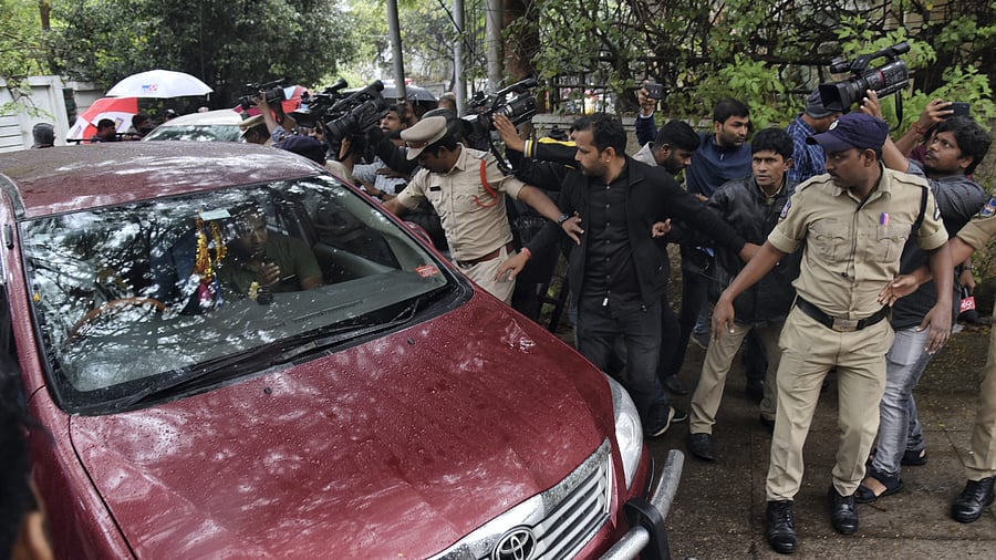 CBI officials arrive at TRS MLC Kavitha's residence in Hyderabad. Credit: PTI Photo