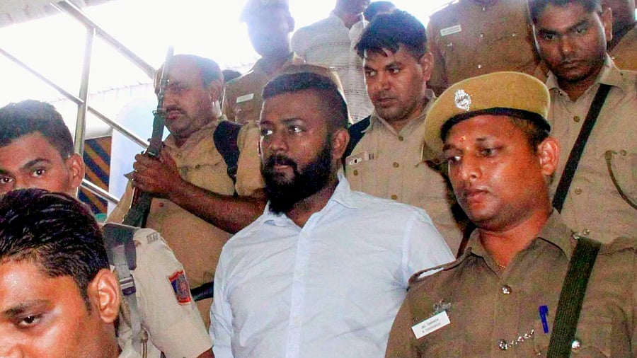 Sukesh Chandrashekhar (C). Credit: PTI File Photo