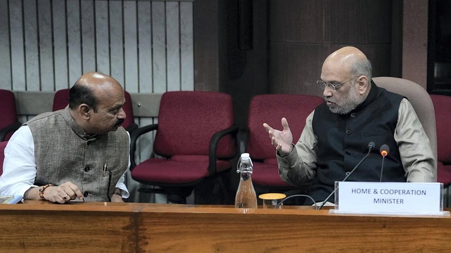 Home Minister Amit Shah with Karnataka CM Basavaraj Bommai during a meeting at Parliament Library, in New Delhi. Credit: PTI Photo