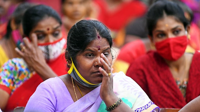Domestic workers have to work in 6 households to make minimum wage ...