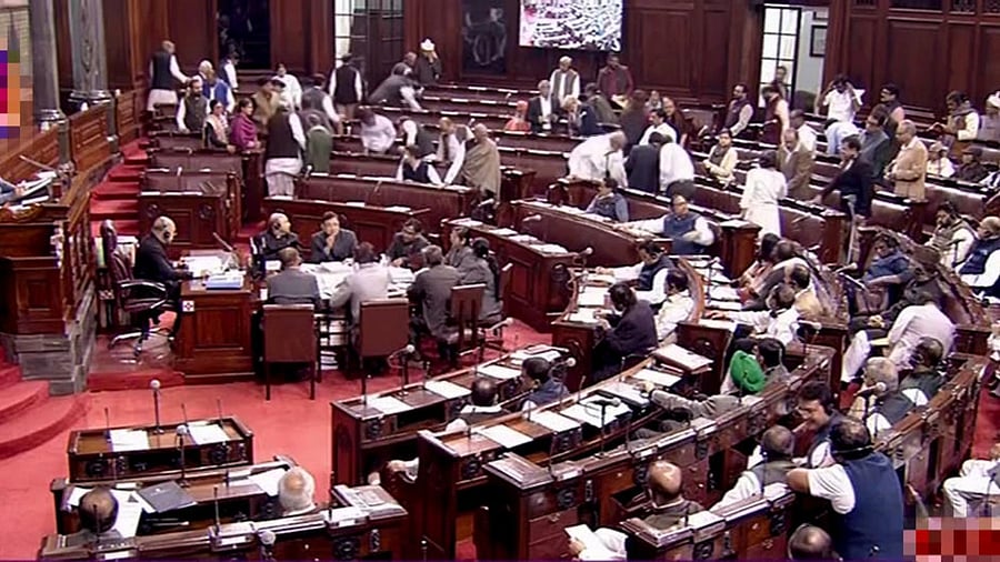 Opposition leaders walkout from the Rajya Sabha during the ongoing Winter Session of Parliament. Credit: PTI Photo