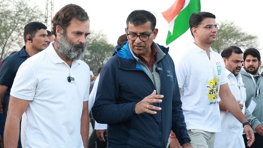 Rahul Gandhi with former RBI chief Raghuram Rajan during the Bharat Jodo Yatra in Rajasthan. Credit: Reuters Photo