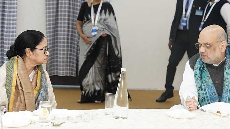 Union Home Minister Amit Shah with West Bengal Chief Minister Mamata Banerjee on the sidelines of the 25th meeting of the Eastern zonal council at Nabanna in Howrah on Saturday December 17,2022. Credit: IANS Photo