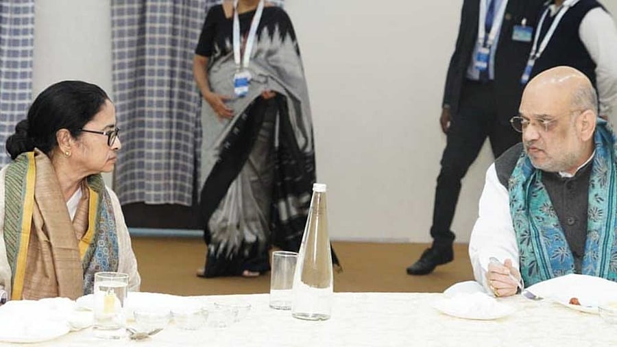 West Bengal CM Mamata Banerjee (L) and Union Home Minister Amit Shah (R). Credit: IANS Photo