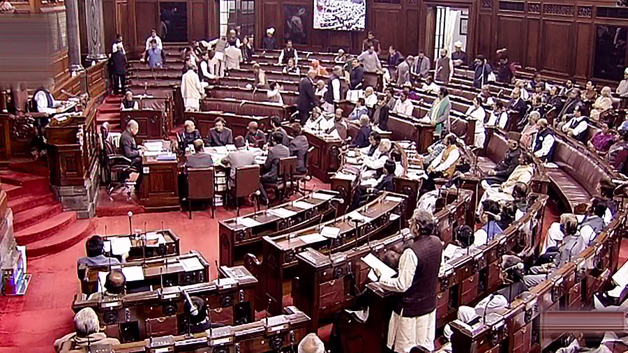 Opposition MPs walk out from the Rajya Sabha during the ongoing Winter Session of Parliament. Credit: PTI Photo