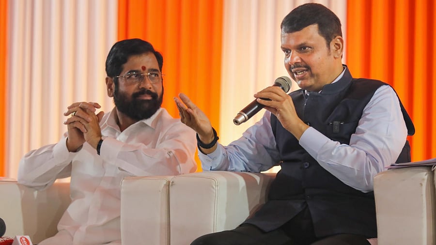 Maharashtra CM Eknath Shinde (right) with with the state deputy Chief Minister Devendra Fadnavis (left). Credit: PTI Photo