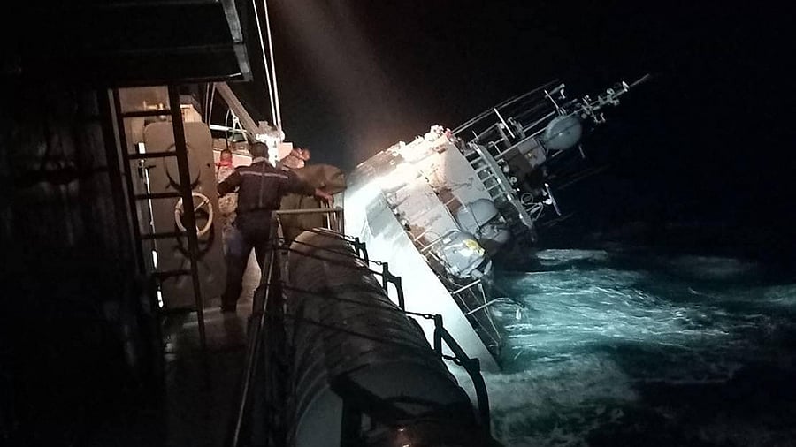 This handout photo taken on December 18, 2022 and released on December 19 by the Royal Thai Navy shows the HTMS Sukhothai warship on its side before sinking in the Gulf of Thailand. Credit: AFP Photo/Royal Thai Navy