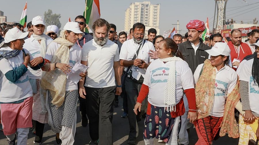 Congress leader Rahul Gandhi with padyatris during the party's Bharat Jodo Yatra, in Alwar district. credit: PTI Photo