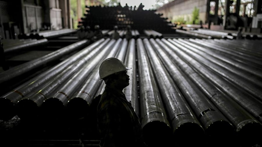 <div class="paragraphs"><p>A worker stands in front of steel tubes at the finishing line of the steel tube mill at the Steel Authority of India Ltd. (SAIL) Rourkela Steel Plant (RSP) in Rourkela district, Odisha, India, on Friday, June 21, 2019. </p></div>