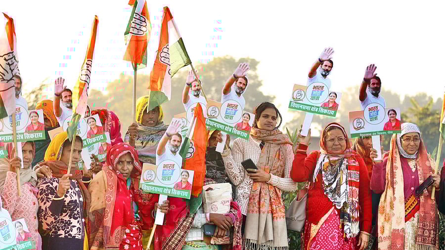 Congress women supporters hold placards during 'Bharat Jodo Yatra', in Dausa district, Rajasthan. Credit: IANS Photo