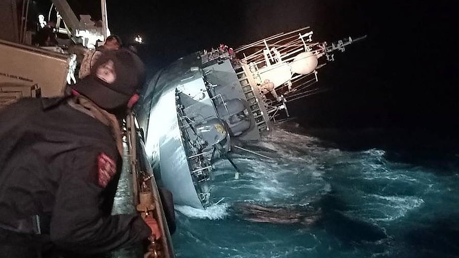 HTMS Sukhothai warship on its side before sinking in the Gulf of Thailand. Credit: AFP File Photo