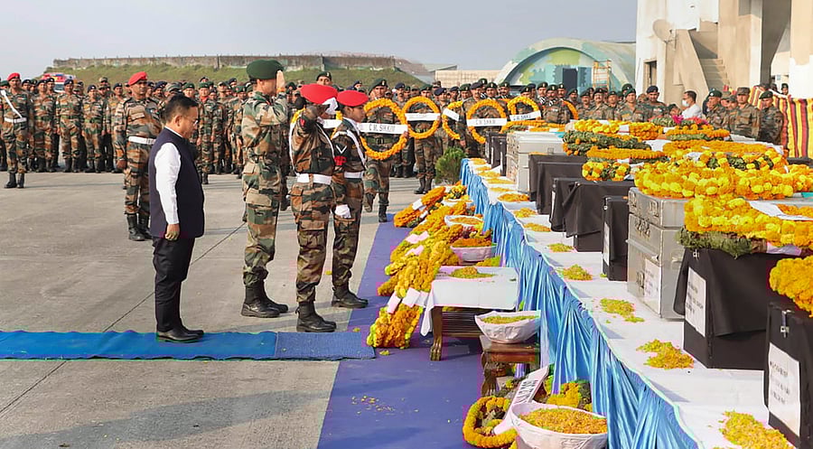 Wreaths were laid for the mortal remains of the deceased soldiers at Bagdogra airport on Saturday. Credit: PTI Photo
