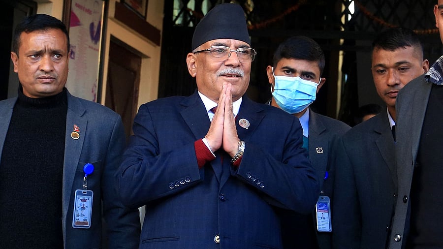 Pushpa Kamal Dahal (2L). Credit: AFP Photo