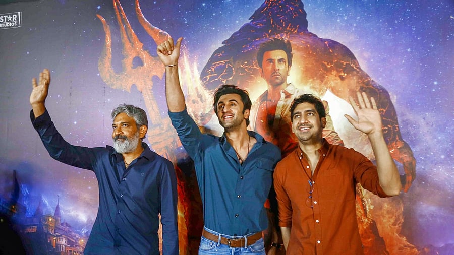 Filmmaker SS Rajamouli, Bollywood actor Ranbir Kapoor and director Ayan Mukerji during a promotional event for 'Brahmastra Part One: Shiva' in Mumbai, March 31, 2022. Credit: PTI File Photo