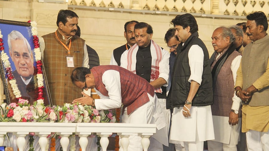 MP CM Shivraj Singh Chouhan with Union Ministers Narendra Singh Tomar and Jyotiraditya Scindia pays tribute to former PM Atal Bihari Vajpayee. Credit: PTI Photo