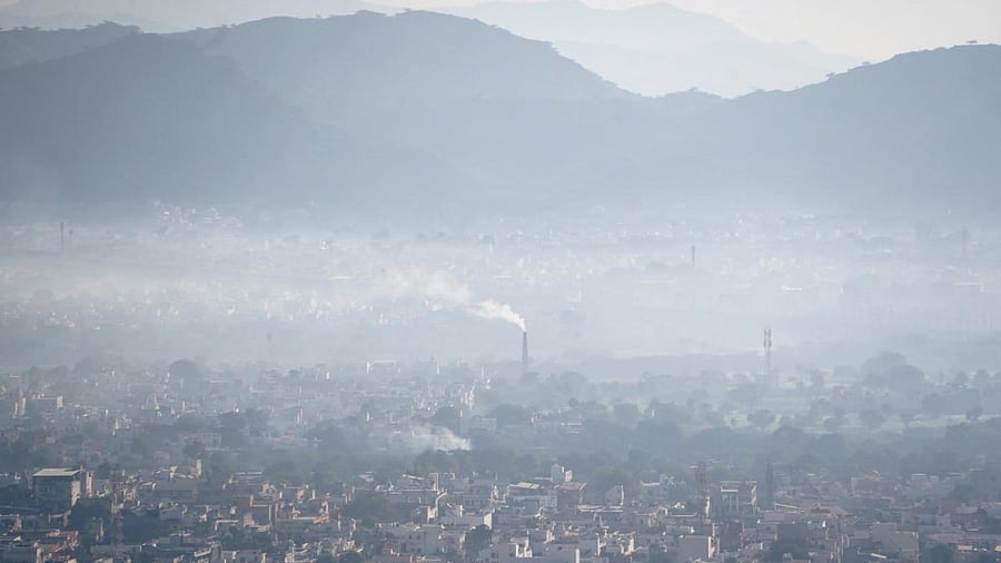 A thick layer of smog engulfs the city on a cold winter morning, in Ajmer. Credit: PTI Photo