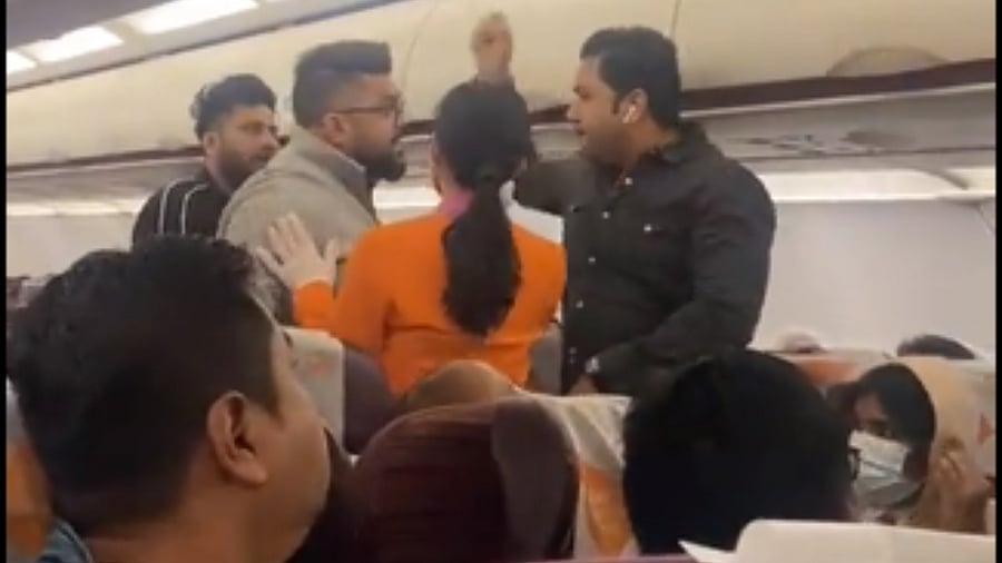 Screengrab of the clip showing the fight onboard the Bangkok-Kolkata flight. Credit: Twitter/27saurabhsinha