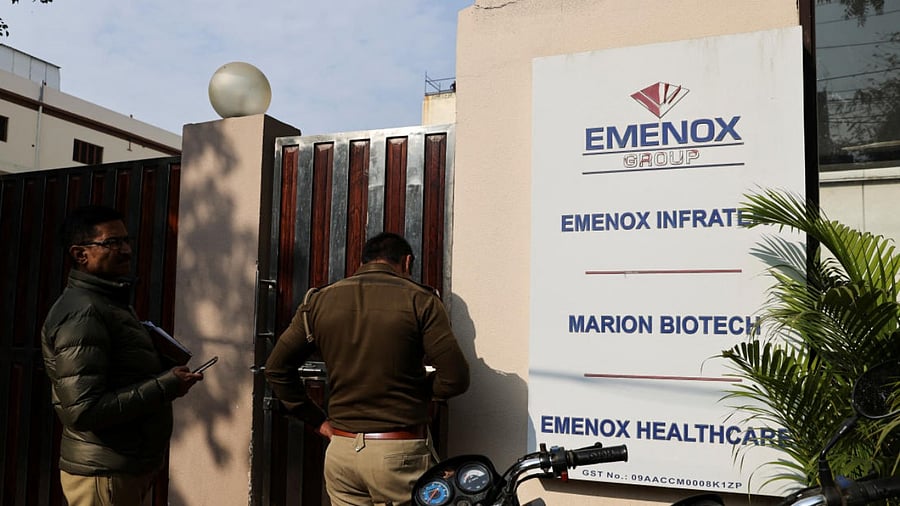 Police is seen at the gate of an office of Marion Biotech, in Noida. Credit: PTI Photo