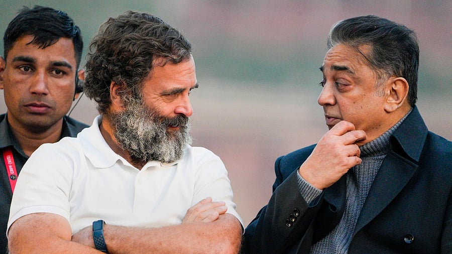 Congress leader Rahul Gandhi with Makkal Needhi Maiam (MNM) leader Kamal Haasan during the Bharat Jodo Yatra, near Red Fort in New Delhi, Saturday, Dec. 24, 2022. Credit: PTI File Photo