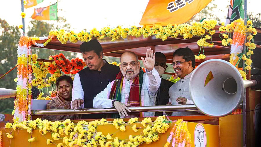 Union Home Minister Amit Shah with Tripura Chief Minister Manik Saha and BJP MP Biplab Deb during a rally at Sabroom in South Tripura district. Credit: PTI Photo