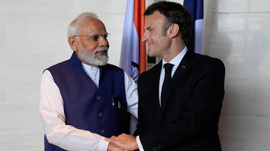 Narendra Modi (left) and Emmanuel Macron. Credit: Reuters photo