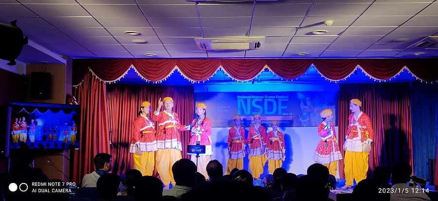 Use anyone picA group performs 'Manav Aur Vignyan'