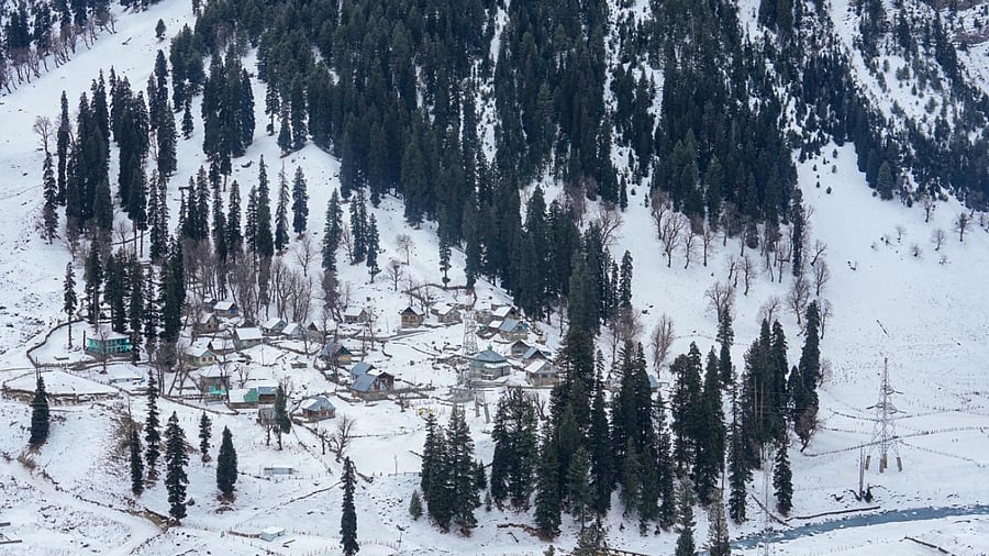 A snow-covered village along the Srinagar-Leh National highway. Credit: PTI Photo