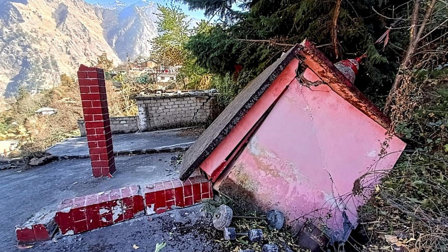 A temple collapses after the gradual 'sinking' of Joshimath in Chamoli district of Uttarakhand, in Joshimath. Credit: PTI Photo