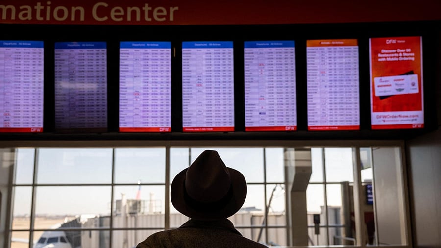 Passengers pass through Dallas-Fort Worth International Airport (DFW) on January 11, 2023 in Dallas, Texas. Credit: Getty Images/AFP