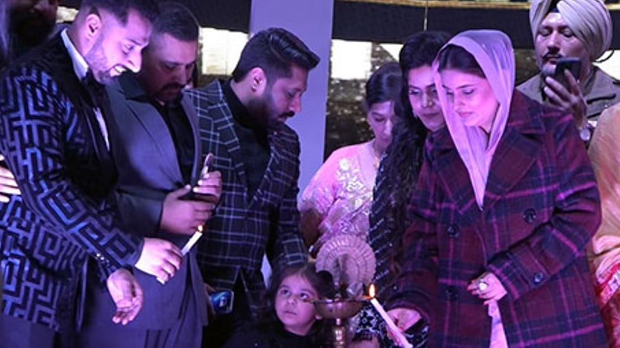 Dr Gurpreet Kaur Mann, wife of Punjab CM Bhagwant Mann lights the traditonal lamp at the launch of HLV Film City in Mohali, Punjab. Credit: Special Arrangement