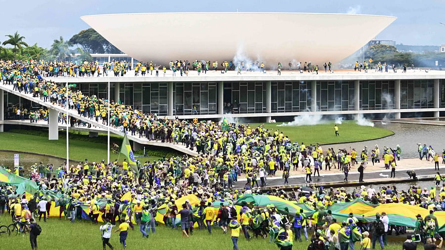  Supporters of Brazilian former President Jair Bolsonaro hold a demonstration at the Esplanada dos Ministerios in Brasilia. Credit: AFP Photo