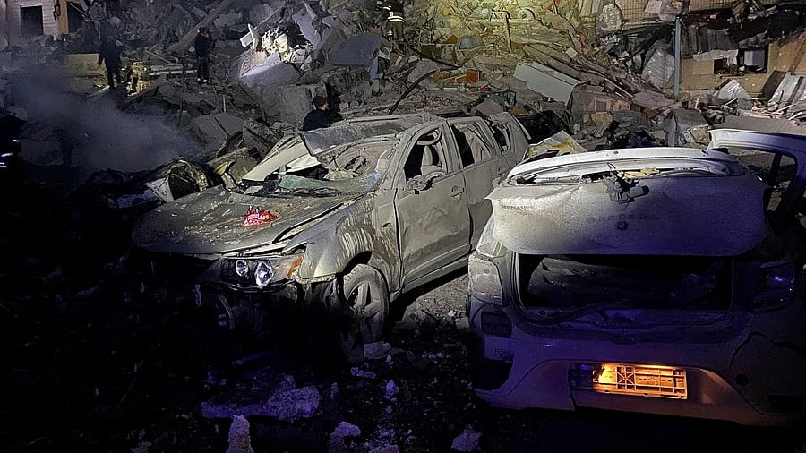 Rescuers work at the site where an apartment building was heavily damaged by a Russian missile strike, amid Russia's attack on Ukraine, in Dnipro. Credit: Press service of the State Emergency Service of Ukraine/via Reuters