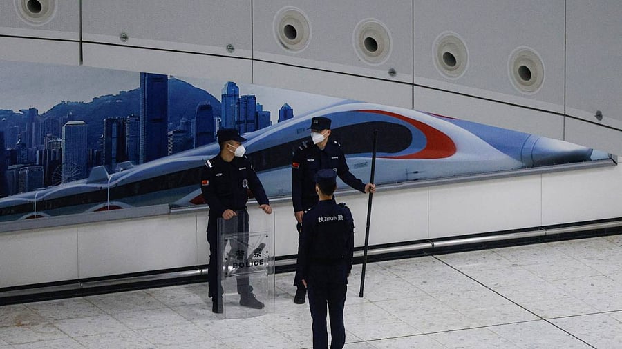 Passengers wait at West Kowloon High-Speed Train Station Terminus on the first day of the resumption of rail service to mainland China post pandemic. Credit: Reuters Photo