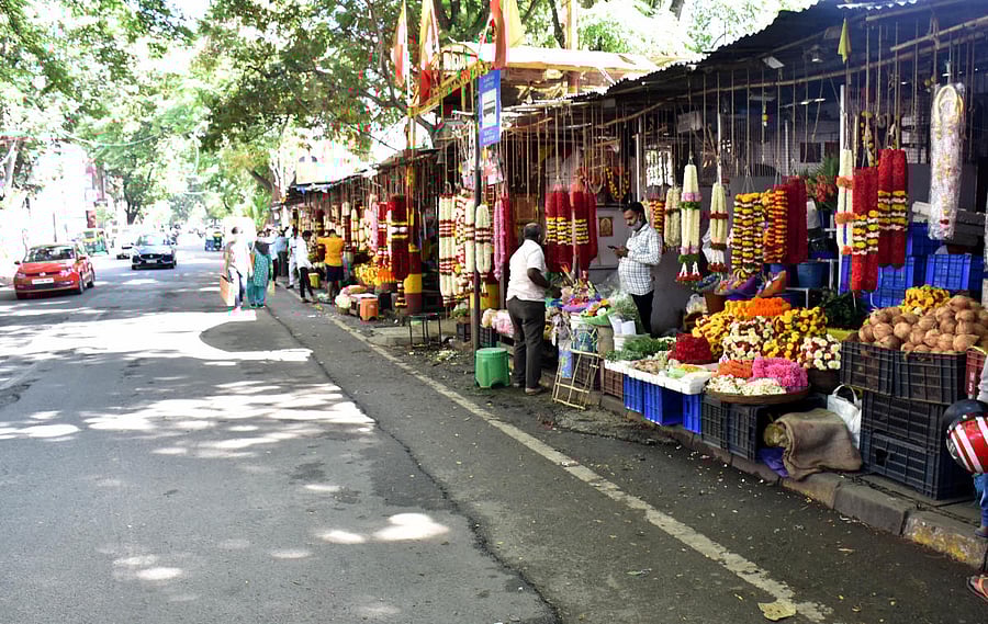The vendors at the market continue to do business from temporary shops allotted to them when the work began in 2015. Credit: DH File Photo