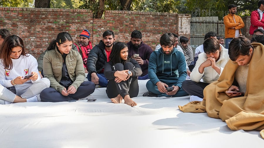Indian wrestlers Bajrang Punia, Sakshi Malik, Vinesh Phogat, Anshu Malik, Sangita Phogat and others stage a strike against the Wrestling Federation of India (WFI), in New Delhi, Wednesday, Jan. 18, 2023. Credit: PTI Photo