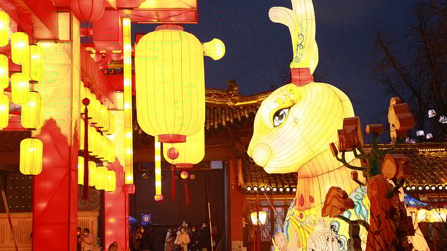 Chinese New year is celebrated to make the transition between signs. 2023 is the year of the rabbit, while 2022 was the year of the tiger. Credit: AFP Photo