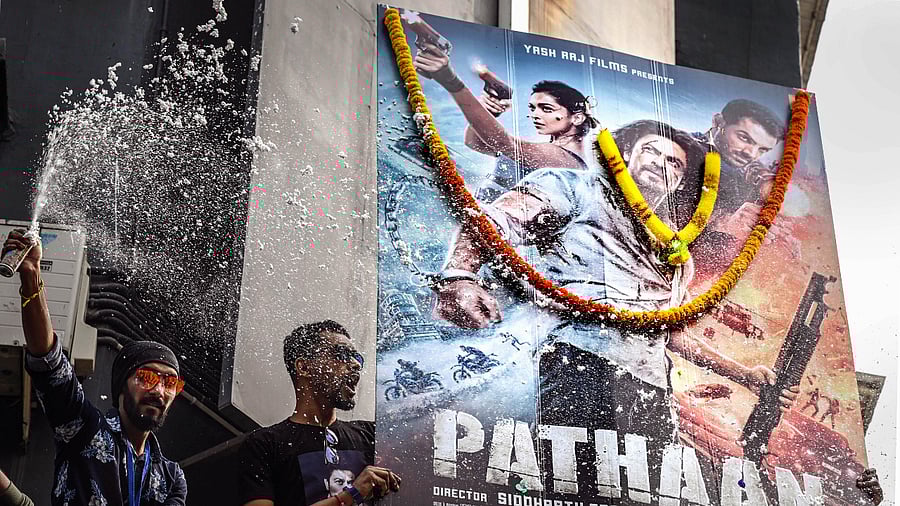 The addition of 300 shows now takes the total screen count of the Siddharth Anand directorial to over 8,000 screens across the globe, making Pathaan one of the widest Hindi releases of all time. Credit: PTI Photo