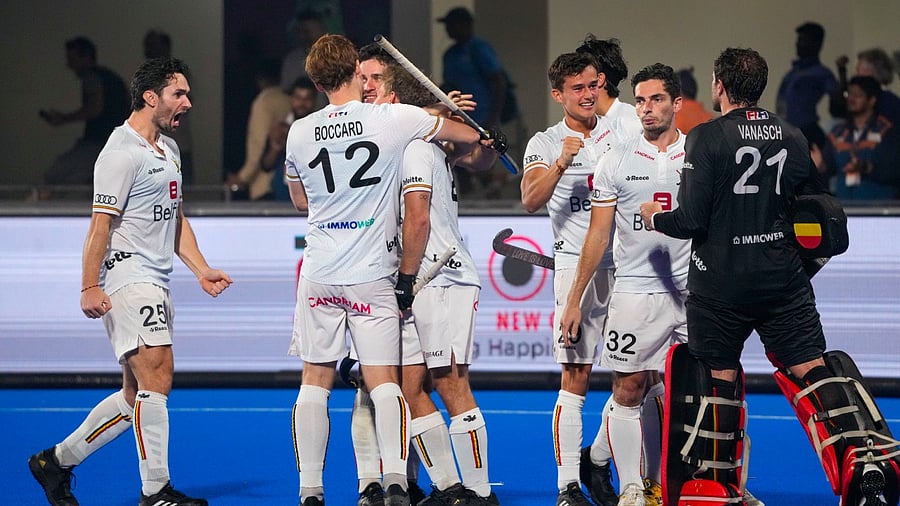 The Belgium team reacts after winning in the penalty shootout against Netherlands during their 2023 Men's FIH Hockey World Cup semi-final match, in Bhubaneswar, Friday, Jan. 27, 2023. Credit: PTI Photo