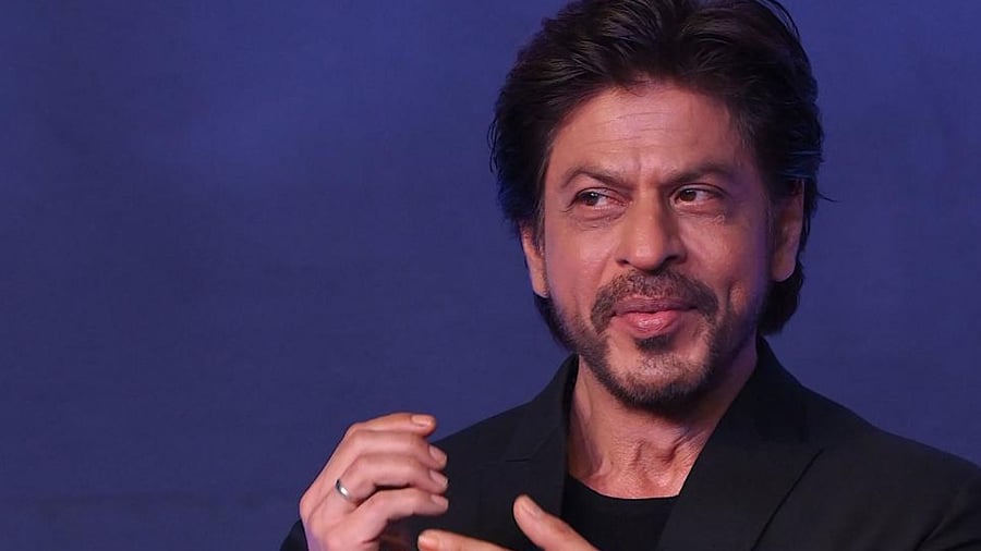 Shah Rukh Khan gestures during a media event of film ‘Pathaan’ in Mumbai. Credit: PTI Photo