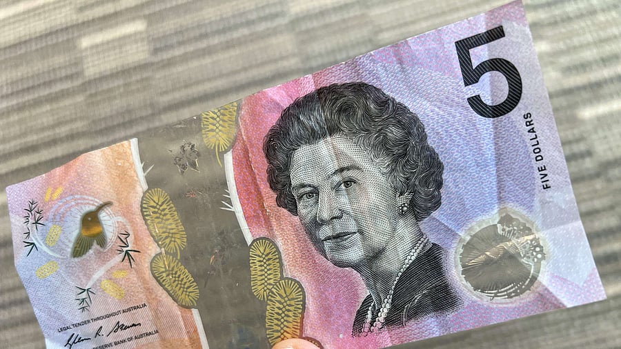 This photo illustration taken in Hong Kong on February 2, 2023 shows the Australian $5 banknote.  Credit: AFP Photo