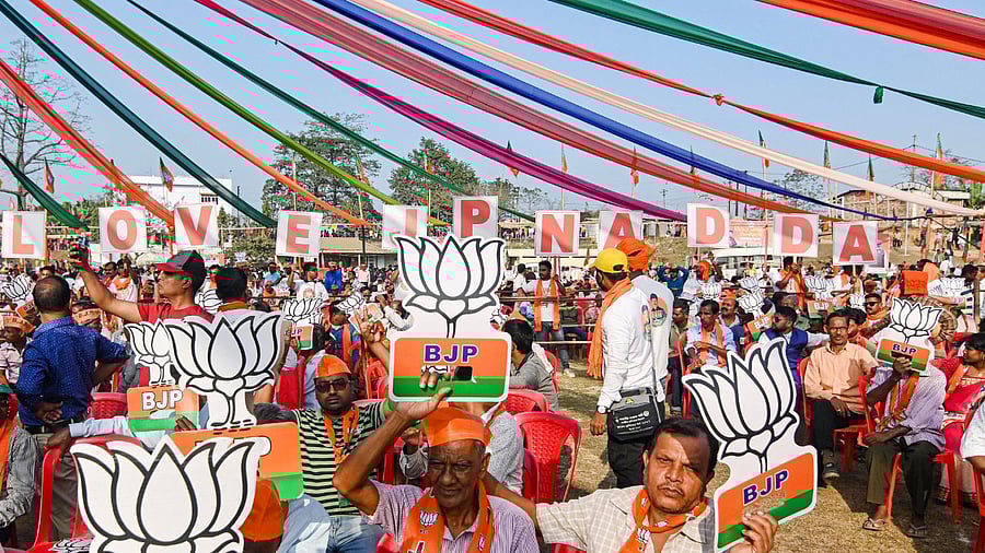 BJP supporters attend the party's 'Vijay Sankalpa Janasabha' rally ahead of Tripura Legislative Assembly elections. Credit: PTI Photo