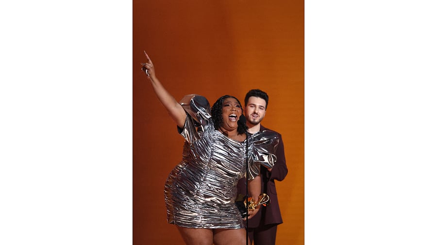 Lizzo accepts the award for Record Of The Year for 'About Damn Time' during the 65th Annual Grammy Awards. Credit: Reuters Photo